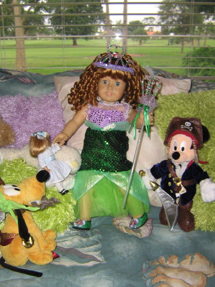 The mermaid next to Pluto (with keys like Pirates of the Caribbean) and Mickey Jack Sparrow
